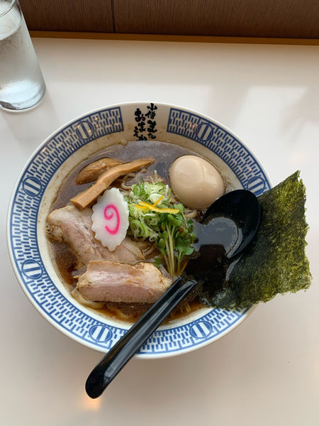 「8種魚介の極上ラーメン(味玉付き)」@小僧またおまえか。 南森町店の写真
