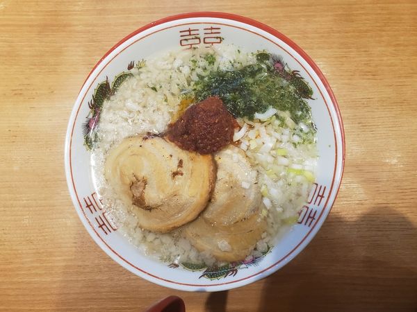 「辛味噌崩し鬼脂中華そば(１２月限定)」@鶏と魚だしのつけめん哲 溝の口店の写真
