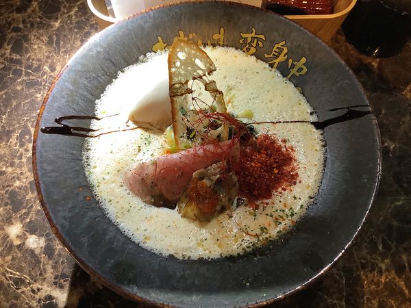 「赤牡蠣ラーメン（1辛）+味玉」@ただいま、変身中。の写真