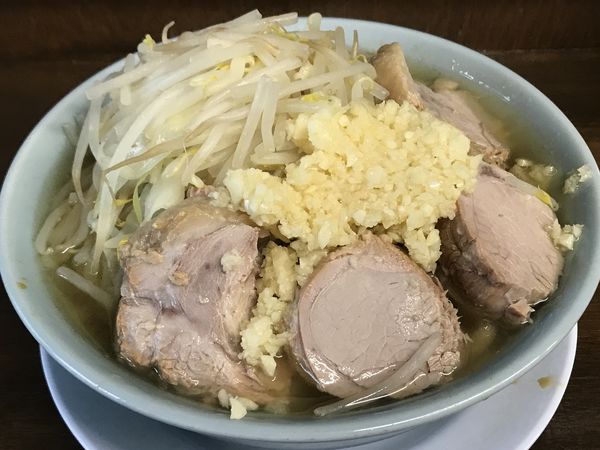 「小豚麺かため、にんにく&生卵&黒烏龍茶」@らーめん玄の写真