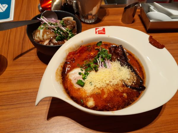 「辛トマトガーリック白湯ラーメン」@RAMEN FACTORY TORISETSUの写真