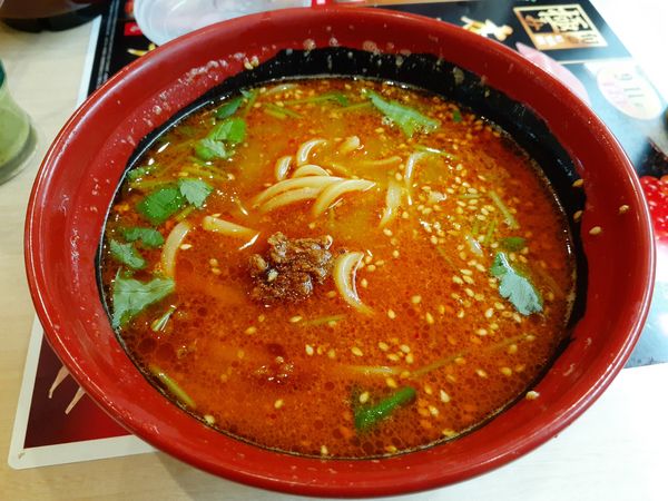 「胡麻三つ葉香る担々麺」@無添くら寿司 京王若葉台店の写真
