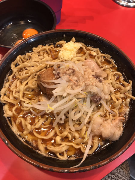 「辛いラーメン＋生卵W」@麺屋 桐龍の写真