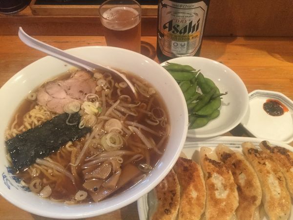 「アサヒスーパードライ・中瓶→ラーメン餃子(¥550+720)」@萬龍軒の写真
