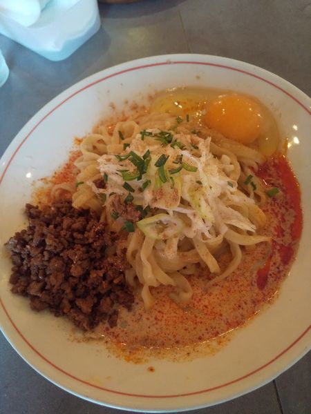 「【週替わり】卵かけ坦々グルグル500円」@GURU GURU SIROHEBI NOODLEの写真