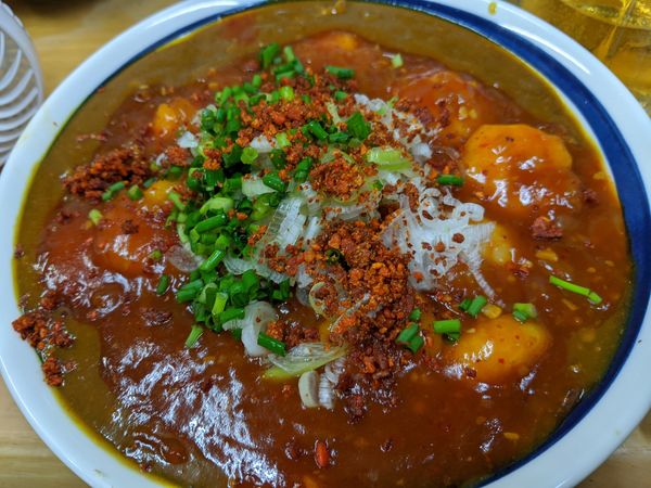 「【限定】辛海老チリ掛けカレー」@MENYA 食い味の道有楽の写真