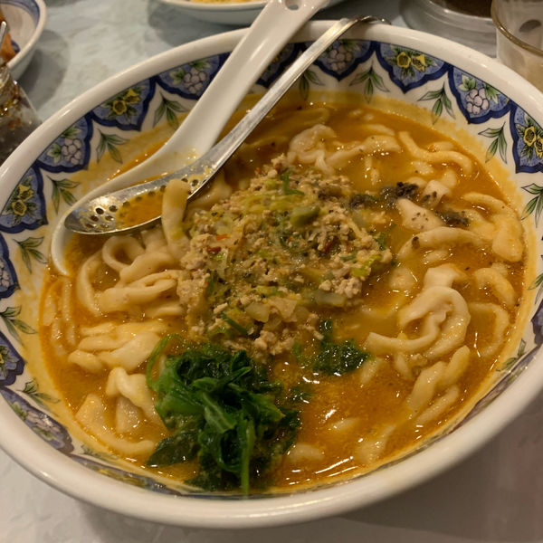 「カレー坦々麺」@中国ラーメン 揚州商人 渋谷センター街店の写真