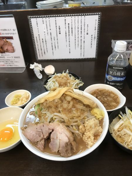 「ラーメン半分  生卵 せんべい 味ネギ」@ラーメンの店 どでん 北浦和店の写真