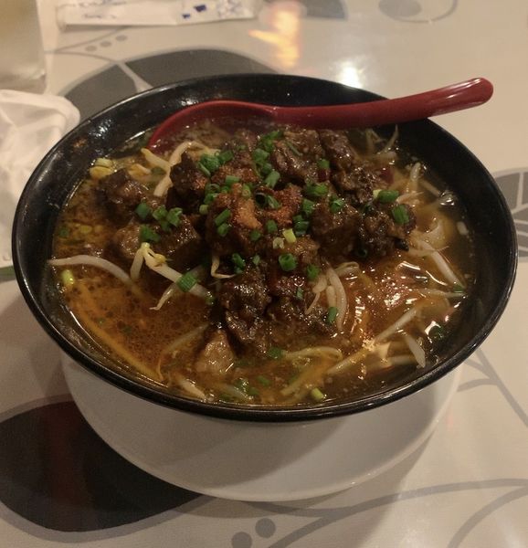 「激辛牛肉刀削麺」@萬福の写真