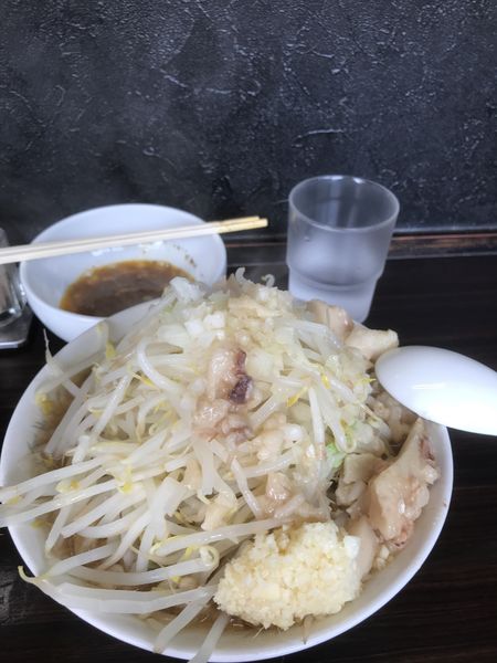 「ミニラーメン 生卵」@らーめん虎丸の写真
