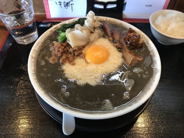 「猪肉でお月見黒担々麺﻿」@麺創 なな家の写真
