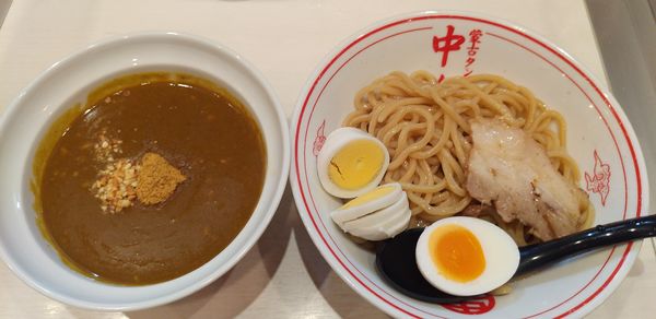 「濃厚カレーつけ麺＋茹で卵スライス」@蒙古タンメン 中本 高田馬場店の写真