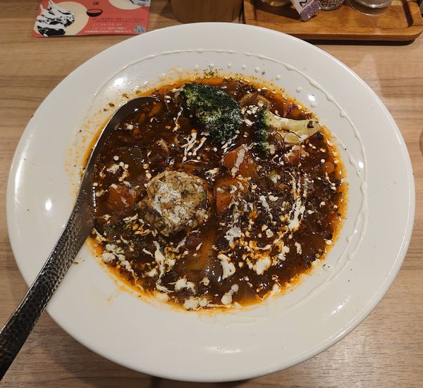 「赤ワインで煮込んだラムシチューＳＯＢＡ(1100円)」@進化論の写真