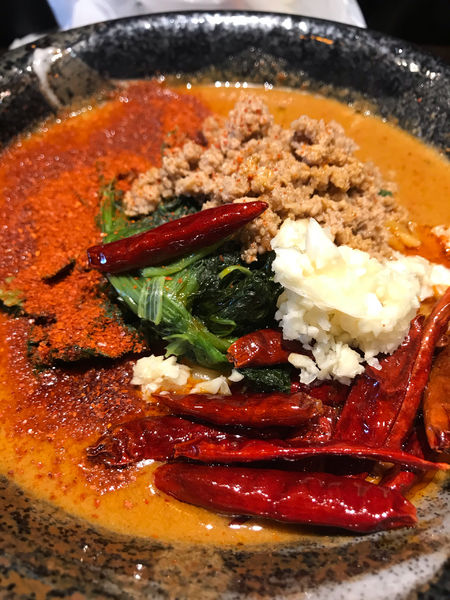 「無限」@地獄の担担麺 護摩龍 五反田店の写真