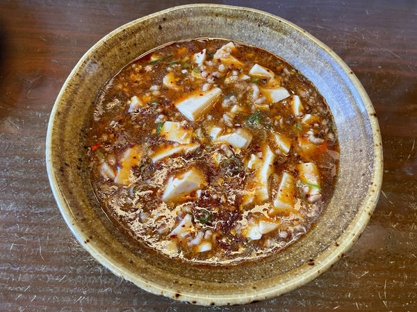 「旨辛麻婆麺(辛２)780+温玉100＋中ライス100」@かいえんの写真