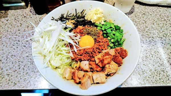 「【限定】台湾まぜそば(ニンニク･追い飯付)+長ネギ」@ラーメン宮郎の写真