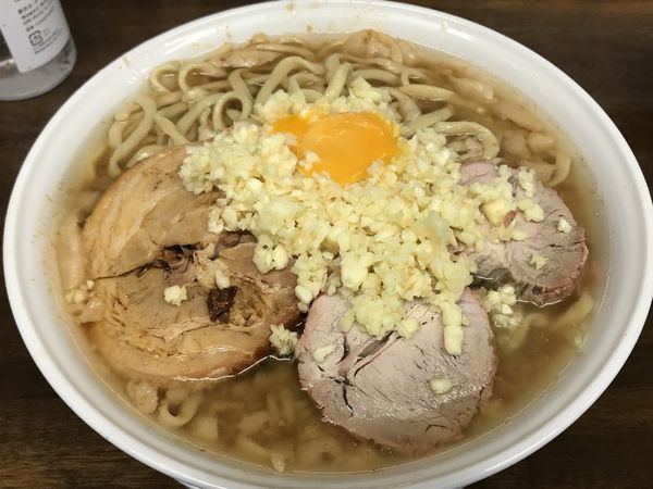 「大麺かため、野菜抜き、にんにく＋W生卵」@らーめん玄の写真