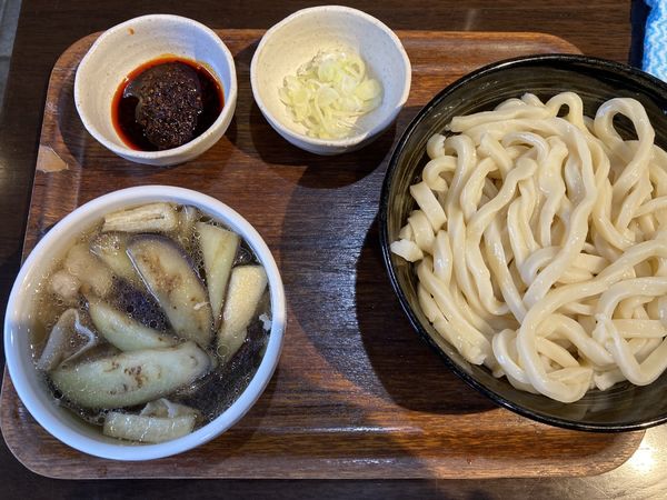 「肉なすうどん(白だし)、辛味」@柿屋うどんの写真