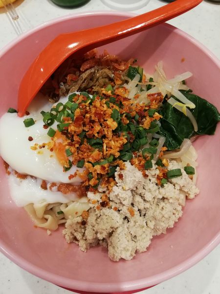 「温玉平打ち手揉み麺」@圧延Japan Meeの写真