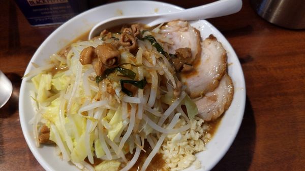 「もつ煮ラーメン（限定）（ニンニクヤサイマシ）+肉１枚」@麺屋 づかちゃんの写真