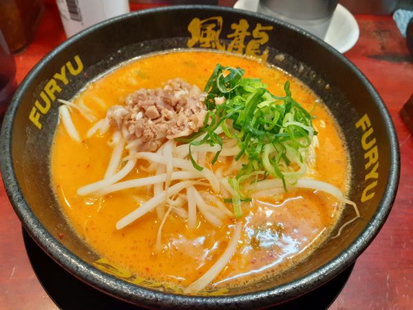 「辛味噌、替玉２玉」@とんこつラーメン 博多風龍 渋谷店の写真