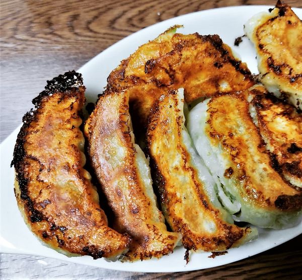 「冷凍餃子(8個)　330円」@さかい食品 三ノ輪店の写真