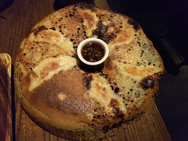 「特製羽根付き焼餃子＋にんにくにんにくにんにく特製羽付き焼餃子」@BAR THE GYOの写真