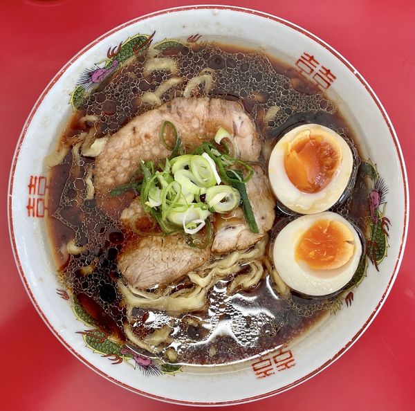 「キリン一番搾り生350ml缶 → 中華そば 黒醤油 ＋ 煮卵」@中華そば 竹千代の写真