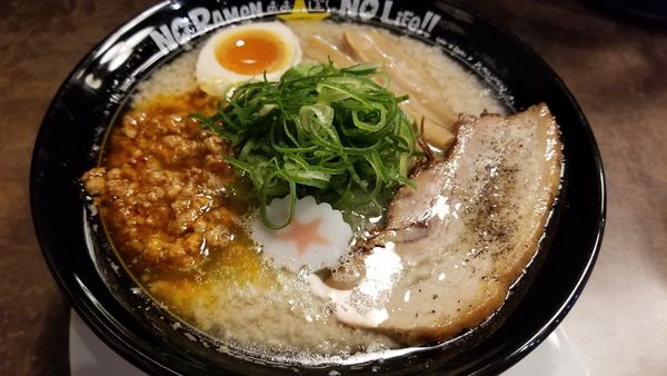 「ノーマルばりこて赤　鬼脂　九条ネギトッピング」@おおぼし 松本桐店の写真