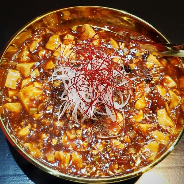 「炎の麻婆麺（３辛）５００円（オープン価格）＋半ライス」@茨谷園の写真