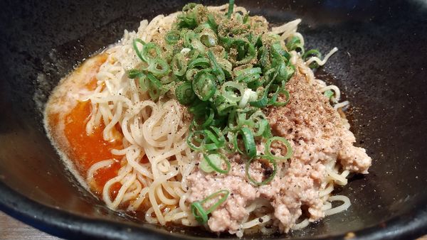 「汁なし担々麺＋温泉卵」@汁なし担担麺専門 キング軒 神田スタンドの写真