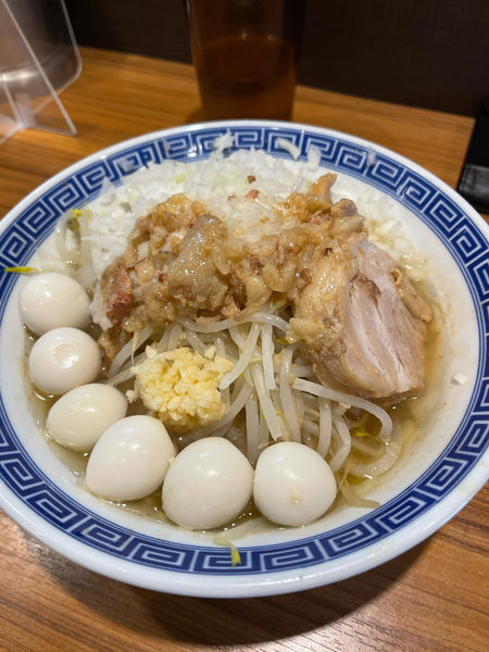 「ミニラーメン（きざみ玉ねぎ＋うずらの卵）」@びんびん豚の写真