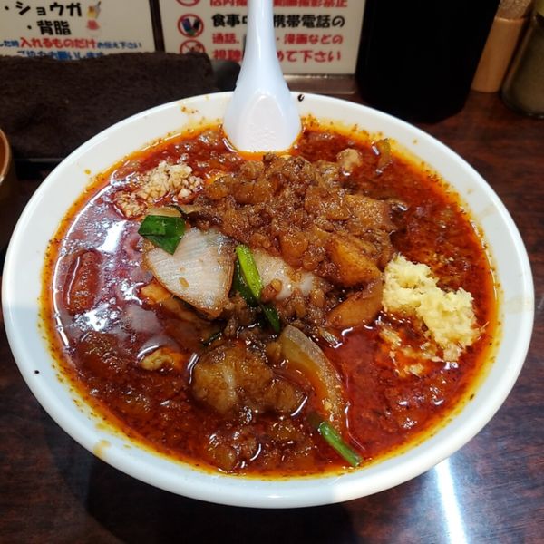 「辛いスタ満そば麺少なめニンニクショウガアブラ＋ポン生玉」@元祖スタミナ満点らーめん すず鬼の写真