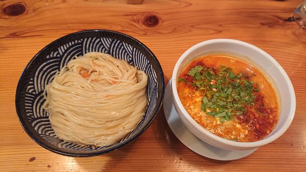 「トマト担々つけ麺」@麺堂にしき 新宿歌舞伎町店の写真