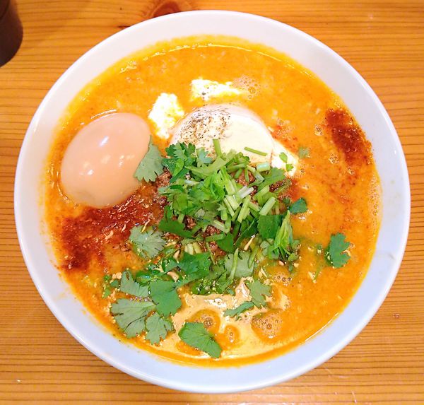 「担々麺【限定】＋味玉」@麺堂にしき 新宿歌舞伎町店の写真