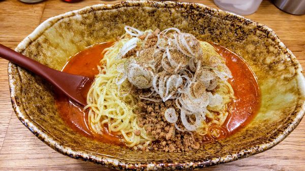 「汁無し坦々麺　３辛　大盛」@くにまつ 中町店の写真