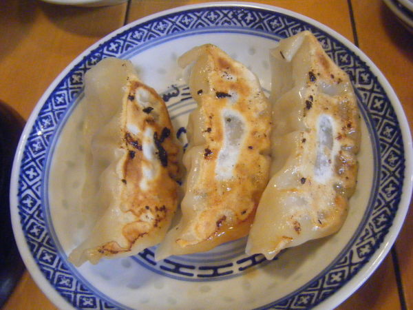 「半餃子」@中国ラーメン 揚州商人 新橋店の写真