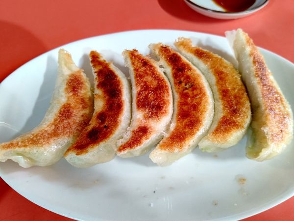 「餃子330円」@中華 久華の写真