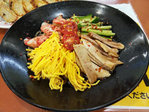 「【限定】辛い！冷し中華　＋餃子２人前（サービス券）」@餃子の王将 諏訪店の写真