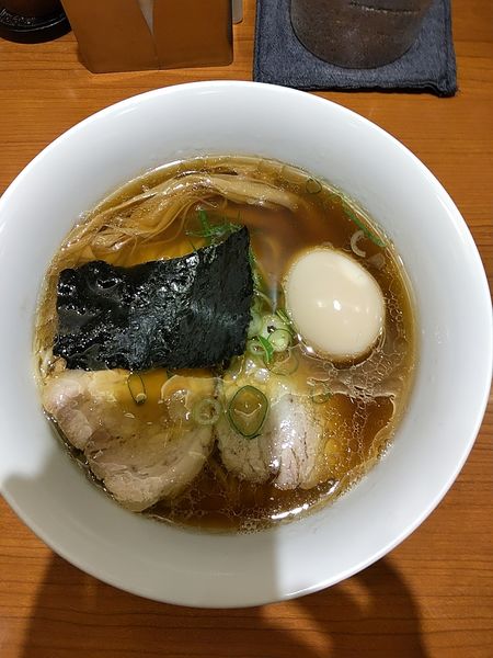 「名古屋コーチン玉子入り」@支那そばや 東京ラーメンストリート店の写真