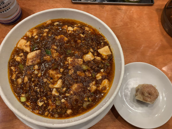 「麻婆麺1000円、肉焼売100円」@SHIBIRE-NOODLES 蝋燭屋 京橋エドグラン店の写真