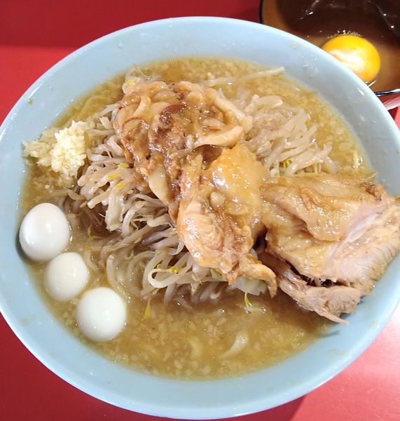 「ラーメン＋生たまご」@蒙麺 火の豚の写真