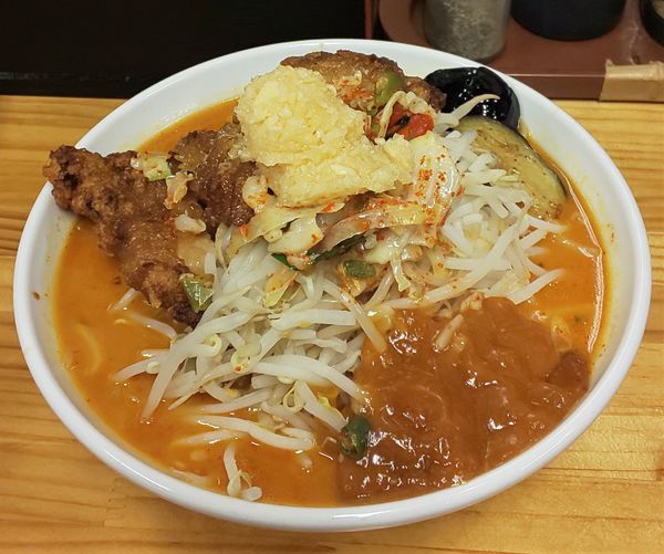 「極辛あんかけDX（メガ唐付) 中盛」@旨辛ラーメン 表裏 市ヶ谷本店の写真