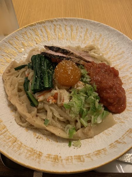 「花咲蟹のアラビアータ風汁なし麺 980円」@ヌイユの写真