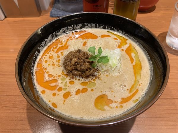 「担々麺」@支那そばや 東京ラーメンストリート店の写真