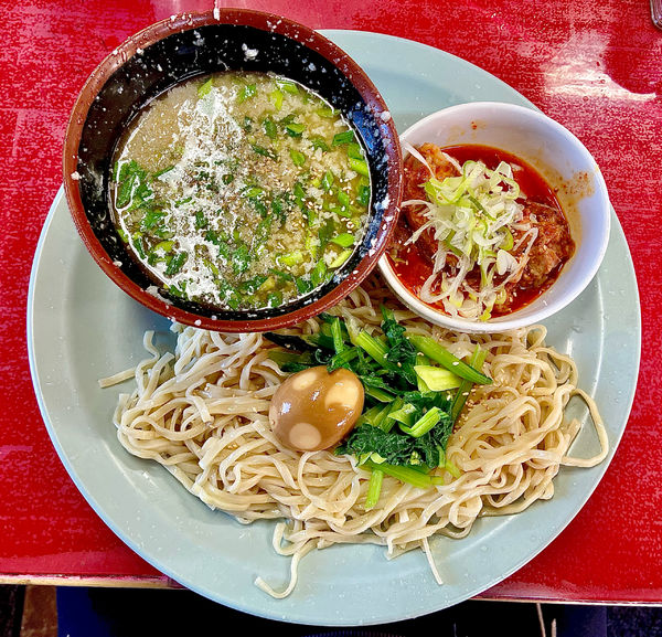 「辛ホルつけ麺【味玉入】」@とん平食堂の写真