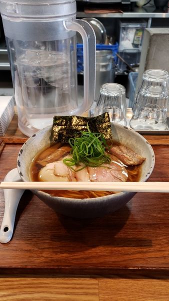 「醤油ラーメン(味玉)950円」@YOKOKURA STOREHOUSEの写真