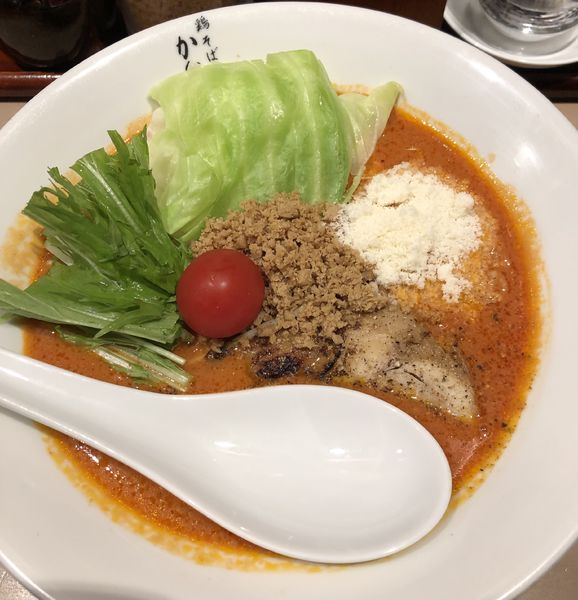 「完熟トマトの塩鶏そば(無料クーポン、900円の品)」@鶏そば かぐら屋 西新宿店の写真