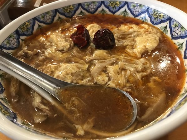 「激辛スーラータンメン」@揚州商人 北山田店の写真