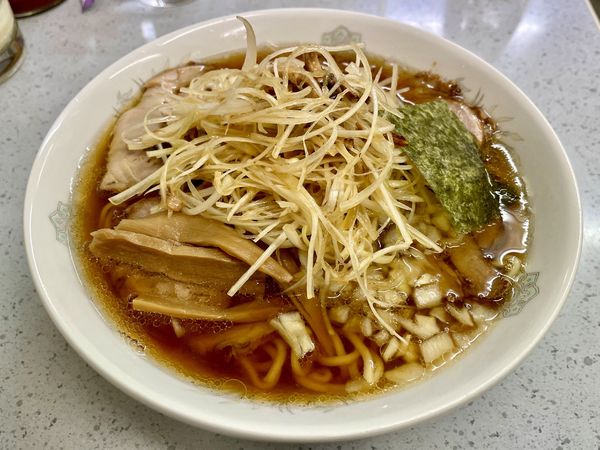 「スーパードライ＋酒熱燗＋チャーシュー皿→ネギチャーシューメン」@丸幸の写真